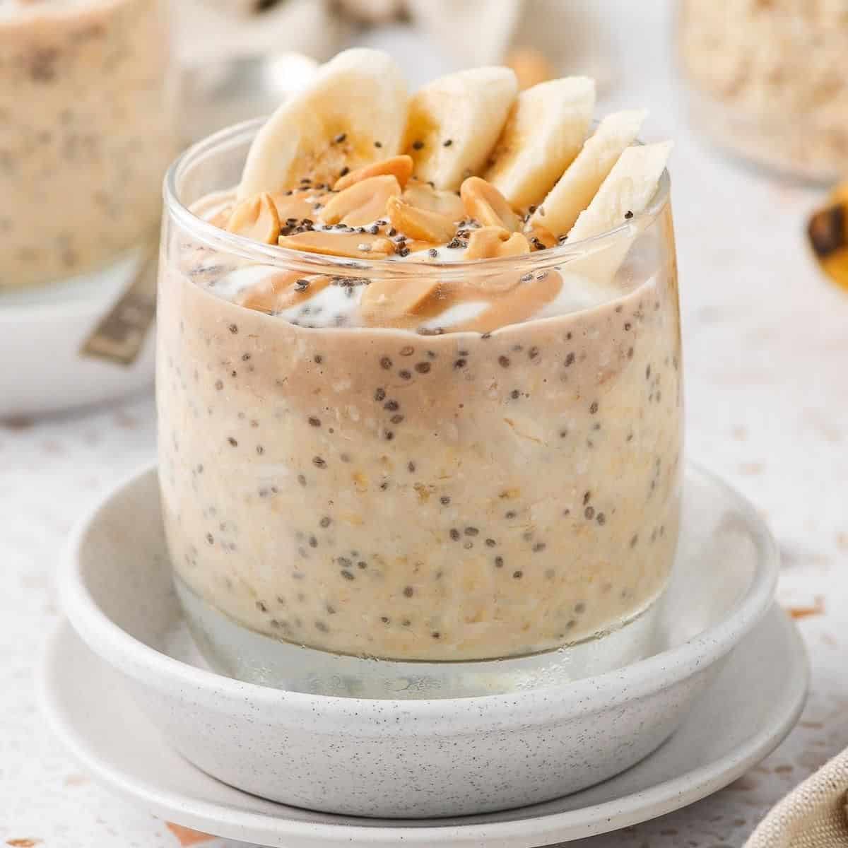 Jar of overnight oats topped with banana slices